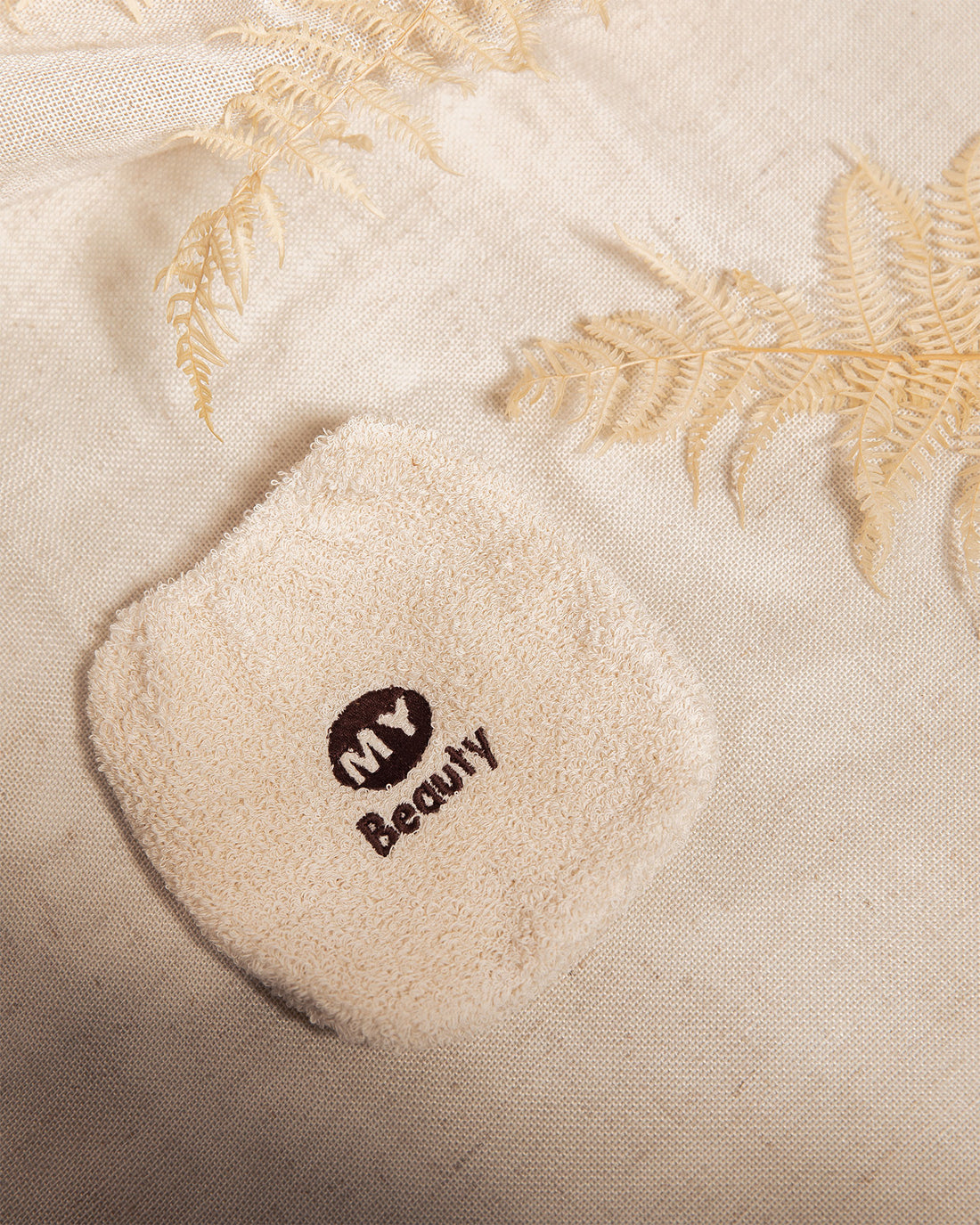 Guanto struccante in cotone biologico